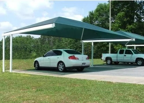 Shadenet canopy over a vehicle parking area